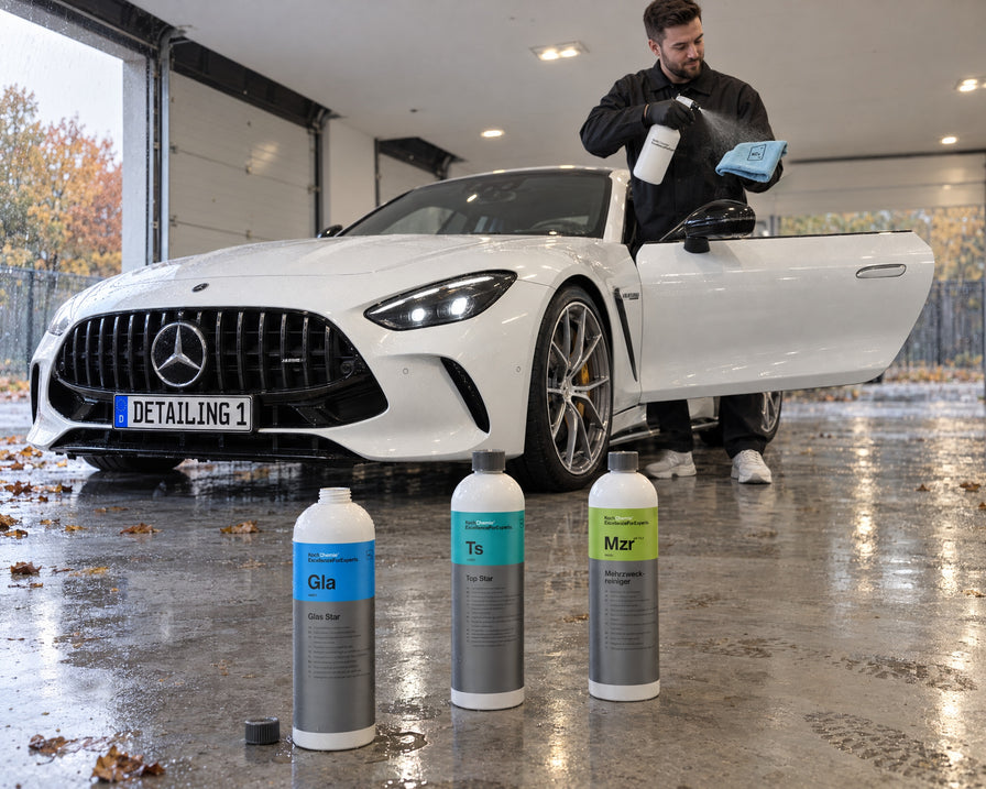 Detailing1 Spotlight : Koch-Chemie Glas Star Gla, Top Star Ts et Mehrzweckreiniger Mzr devant une Mercedes-AMG GT 63 blanche