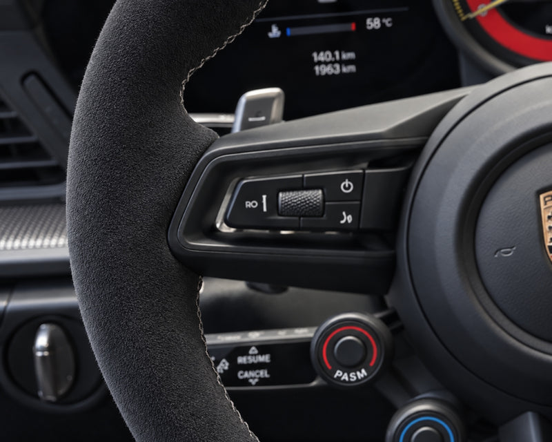 Detailing1 Result — cleaned, dry-brushed Race-Tex steering wheel rim, evenly matte and velvety